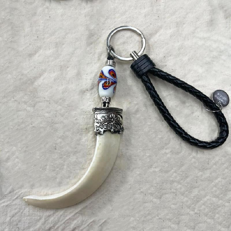 【南島】 原住民飾品鑰匙圈 / 大型山豬牙鑰匙圈-銀頭孔雀商品圖